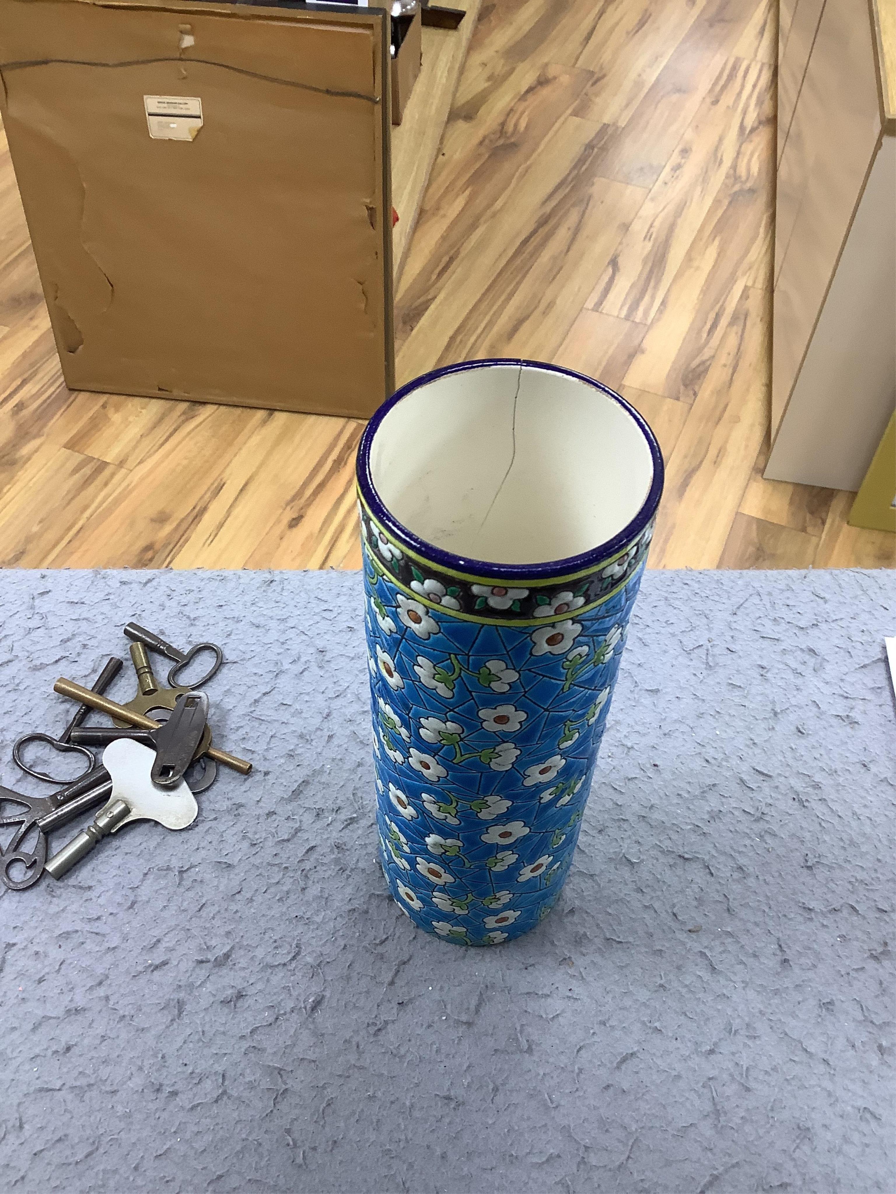 A pair of Longwy pottery cylindrical vases, 23cm high. Condition - one good, minor chip to base, other is cracked